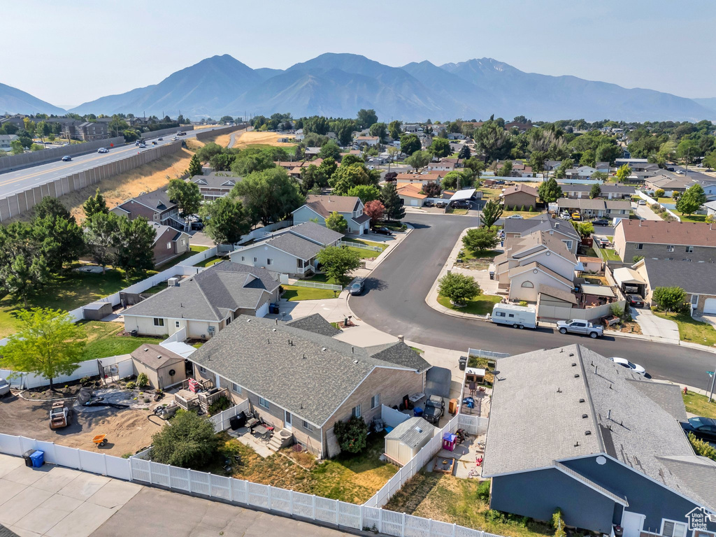Aerial view of residential area with a mountainous background