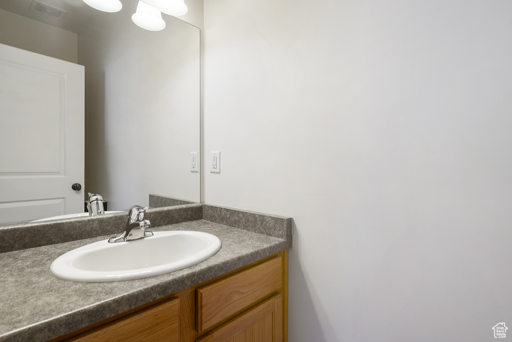 Bathroom featuring vanity