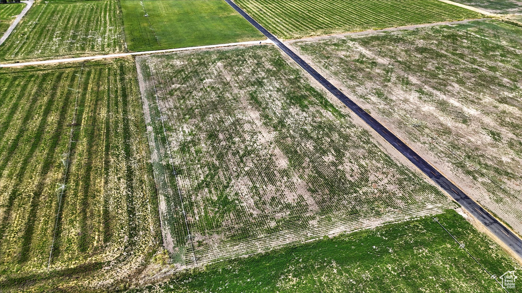 Aerial view of property\'s location featuring rural landscape and extensive farmland