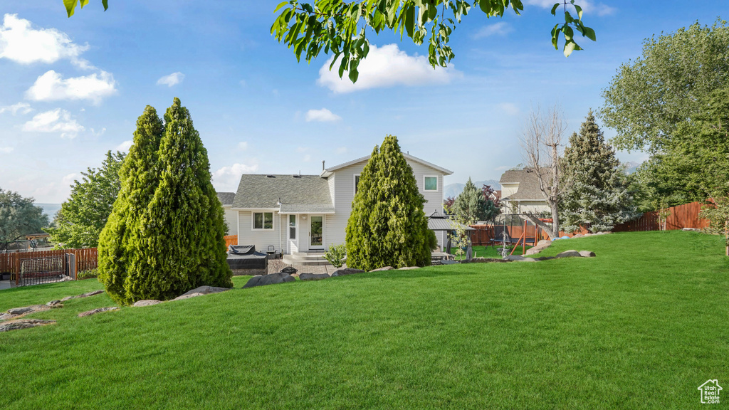 View of fenced backyard