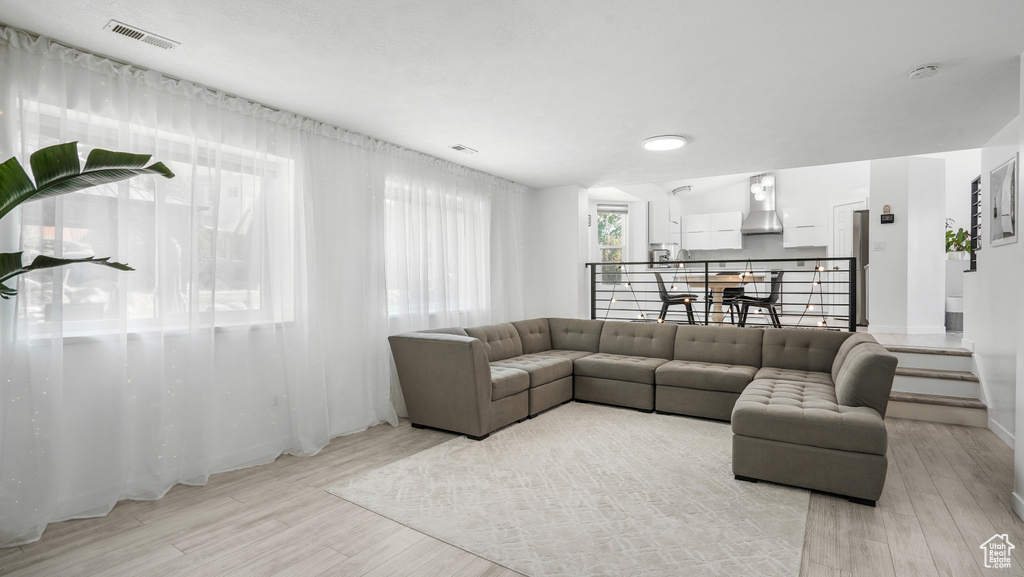 Living room featuring light wood-style flooring