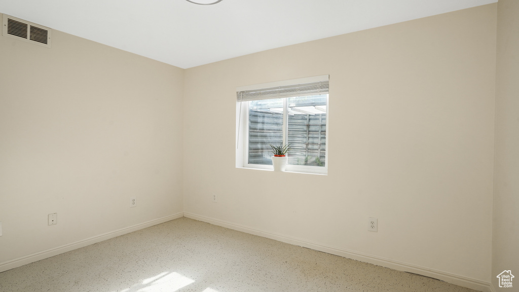 Spare room with baseboards