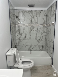 Full bath featuring bathing tub / shower combination and vanity