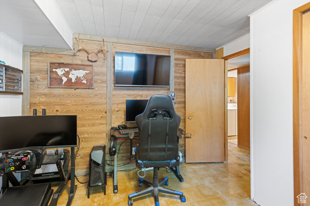 Home office with wooden walls