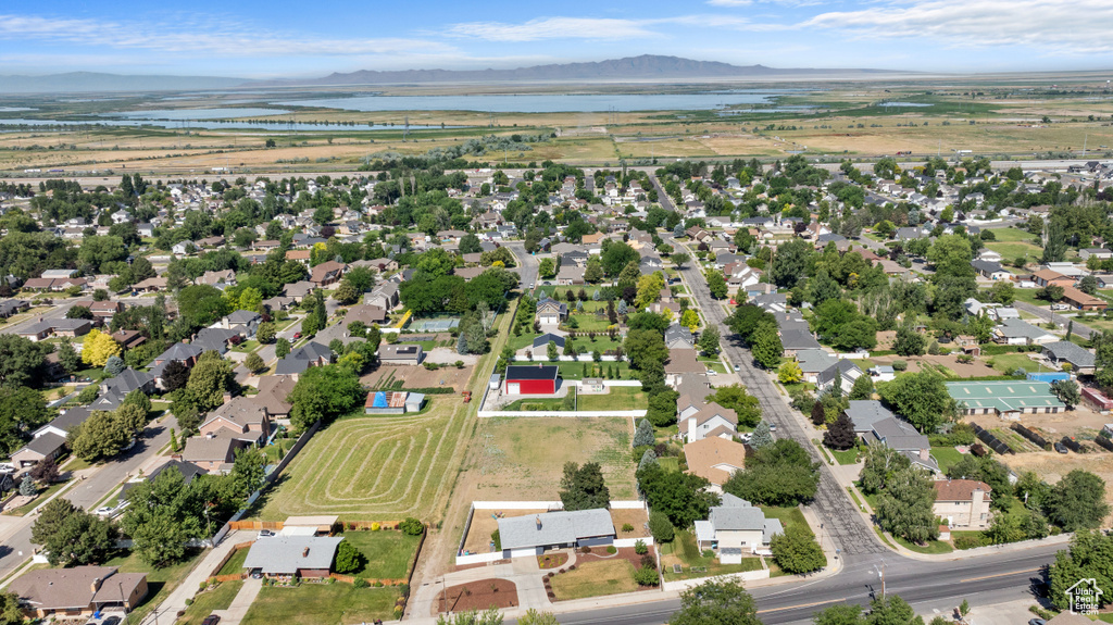 Aerial overview of property\'s location featuring a water and mountain view