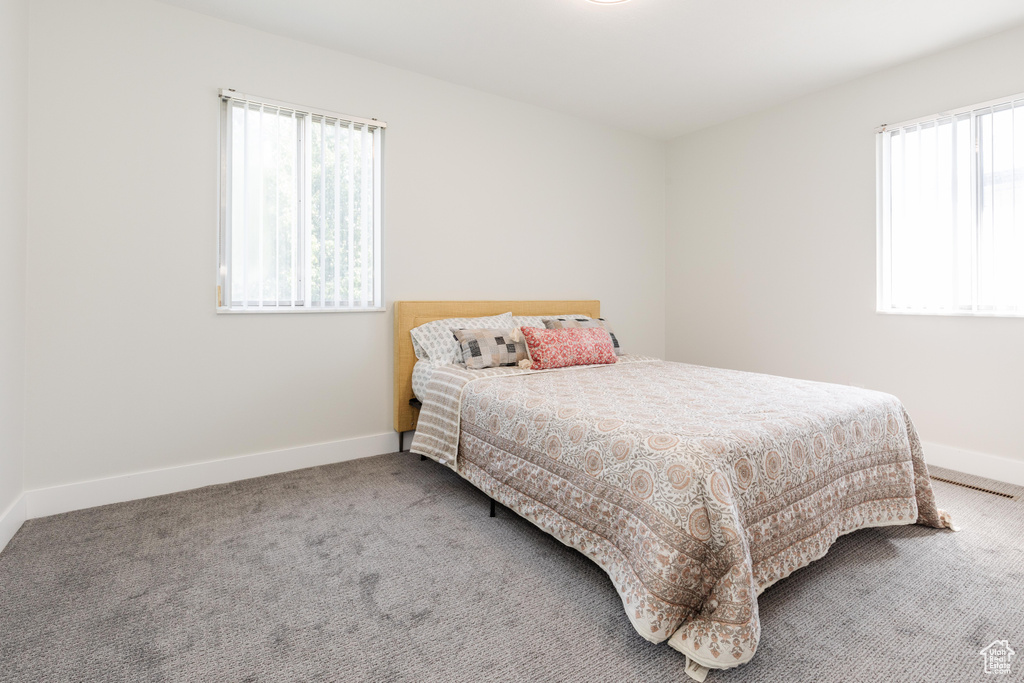 Bedroom featuring carpet flooring