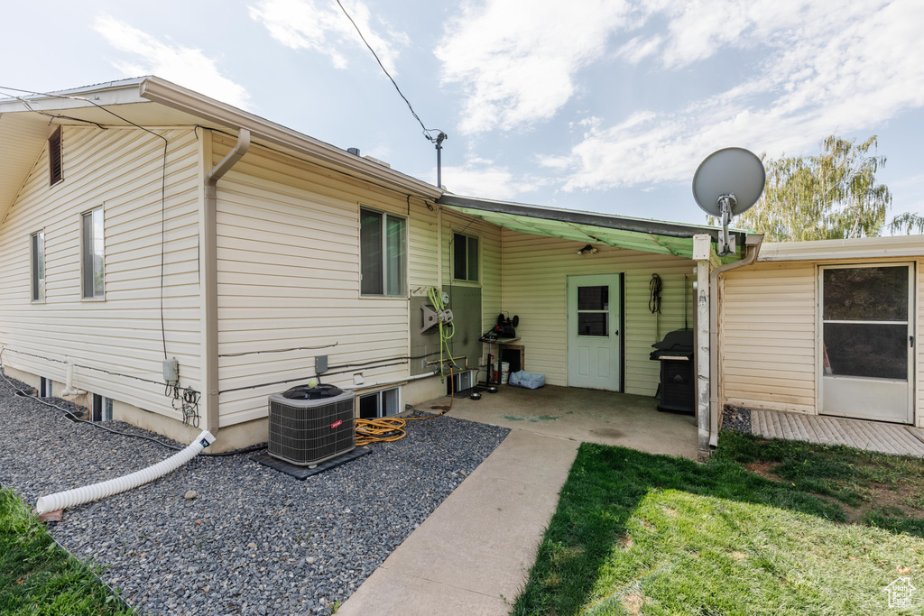 Rear view of house with a patio