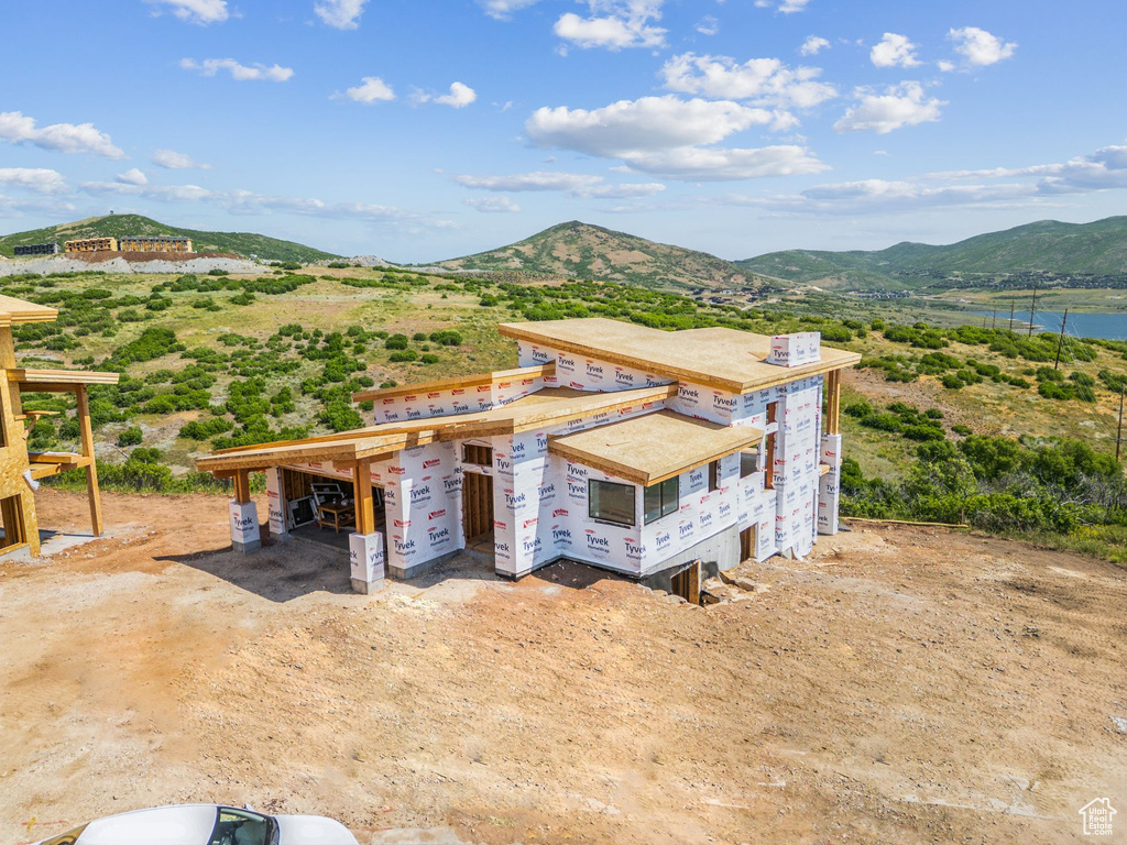 View of front of property featuring a mountain view
