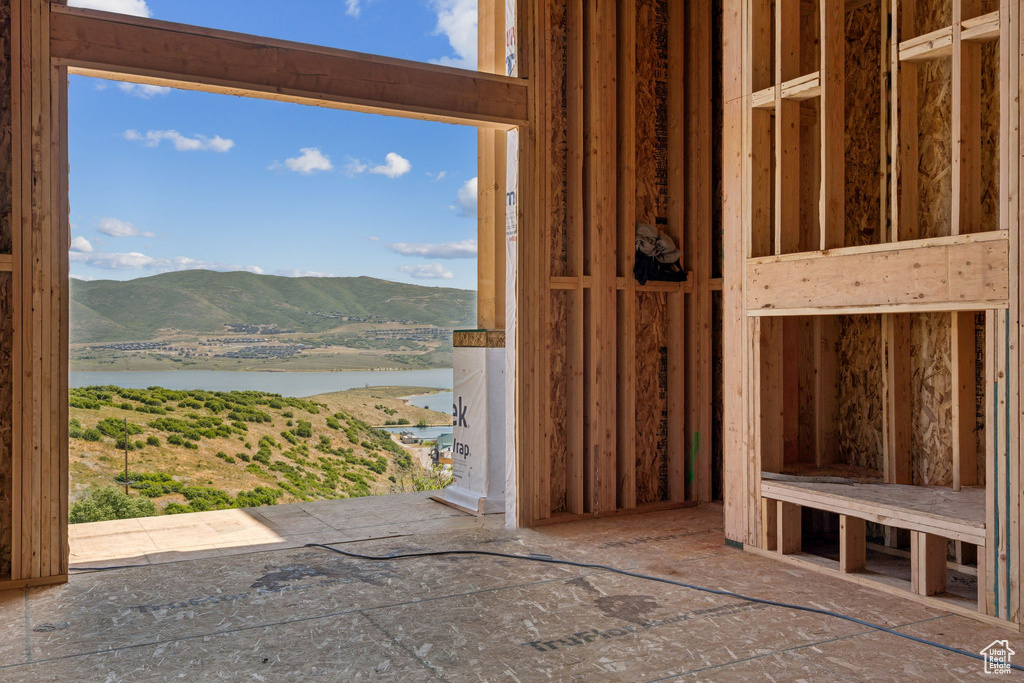 Interior space featuring a water and mountain view