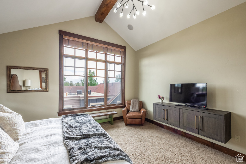 Bedroom featuring carpet flooring and baseboards