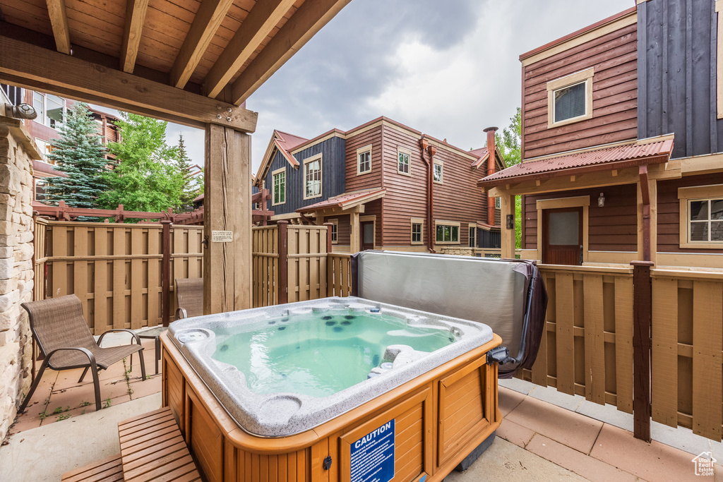 View of patio / terrace featuring a hot tub