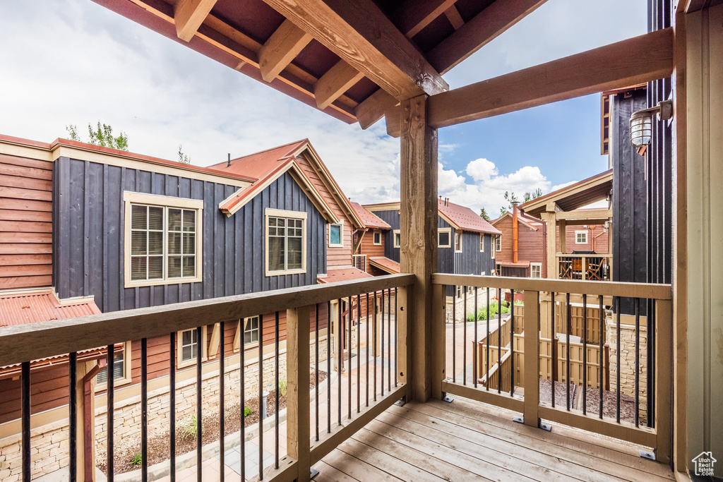 Wooden deck with a residential view