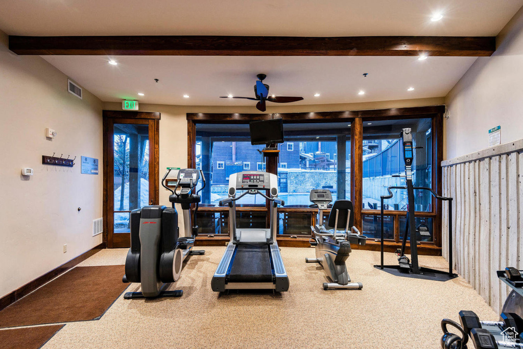 Workout area with beamed ceiling, a ceiling fan, carpet flooring, and recessed lighting
