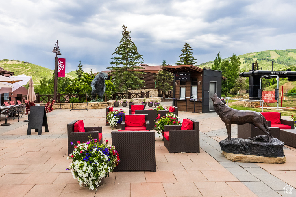 View of patio / terrace with a mountain view