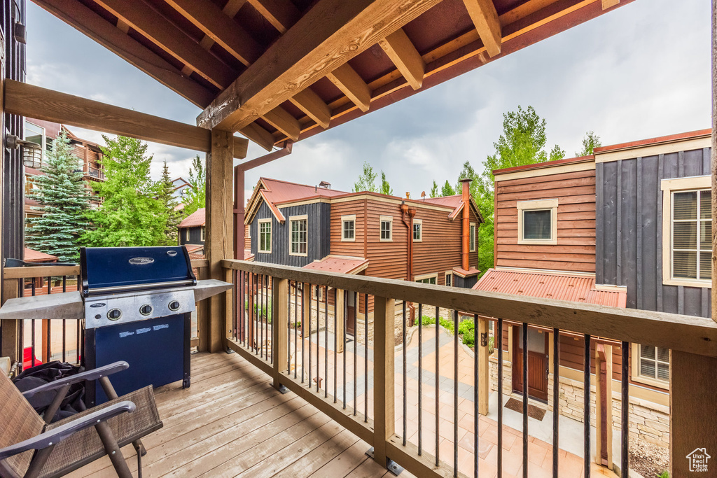 Wooden terrace with a grill