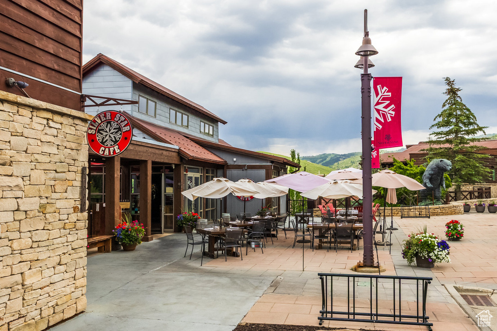 View of patio with outdoor dining area