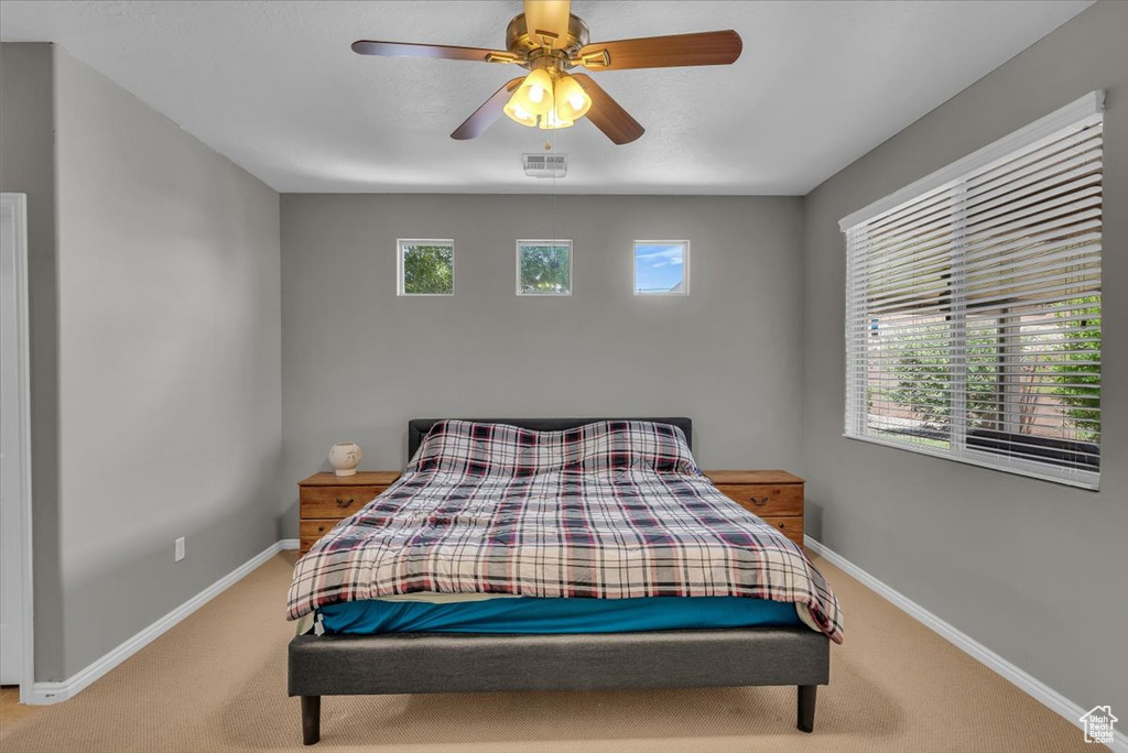 Bedroom featuring carpet floors and a ceiling fan