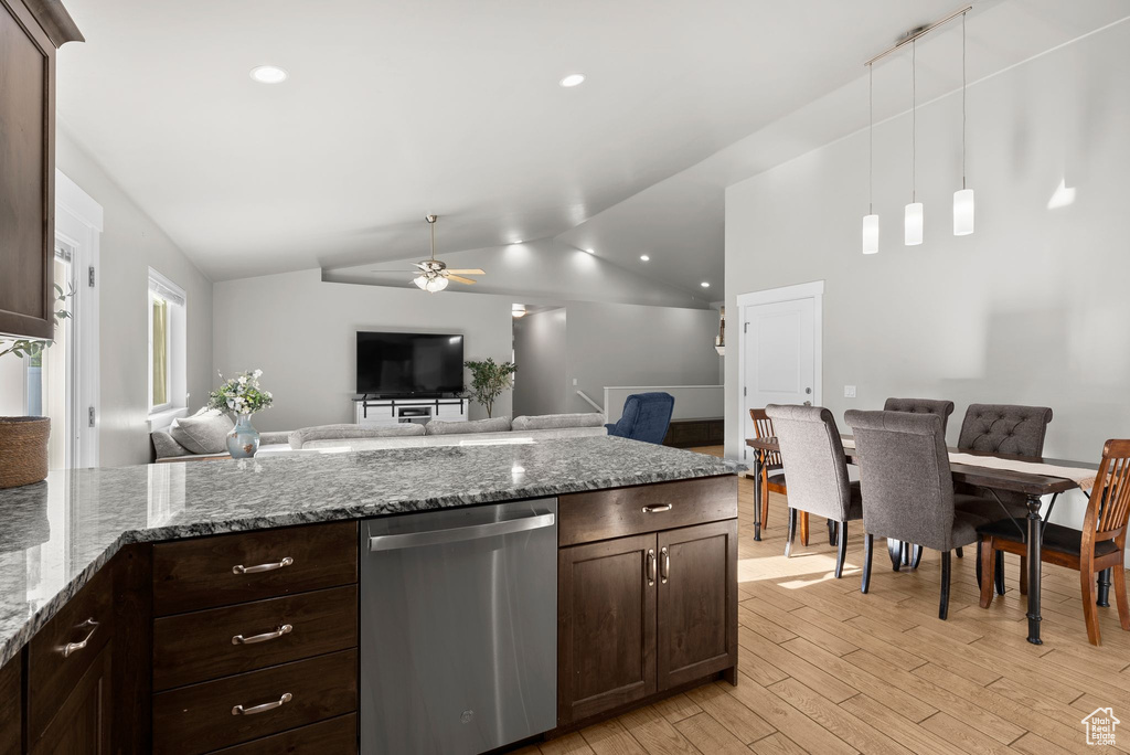 Kitchen with dishwasher, open floor plan, dark brown cabinets, ceiling fan, and light wood finished floors