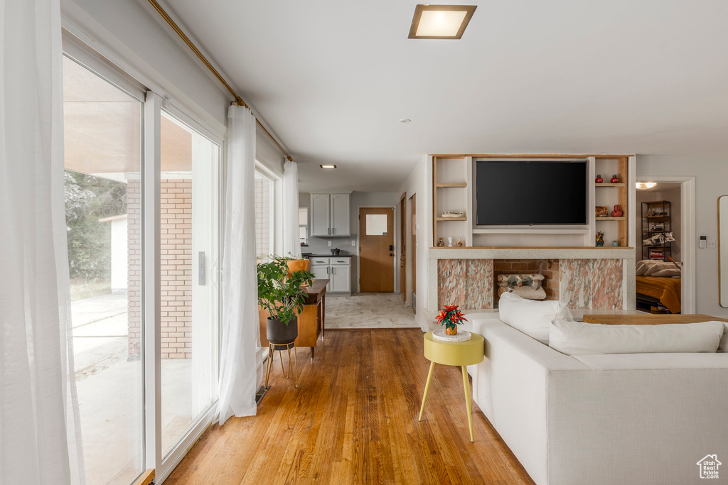 Living room with light wood-type flooring
