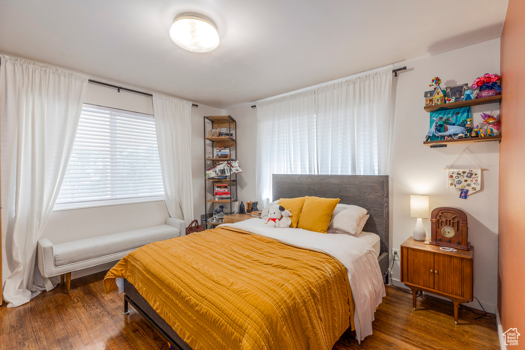 Bedroom featuring wood finished floors