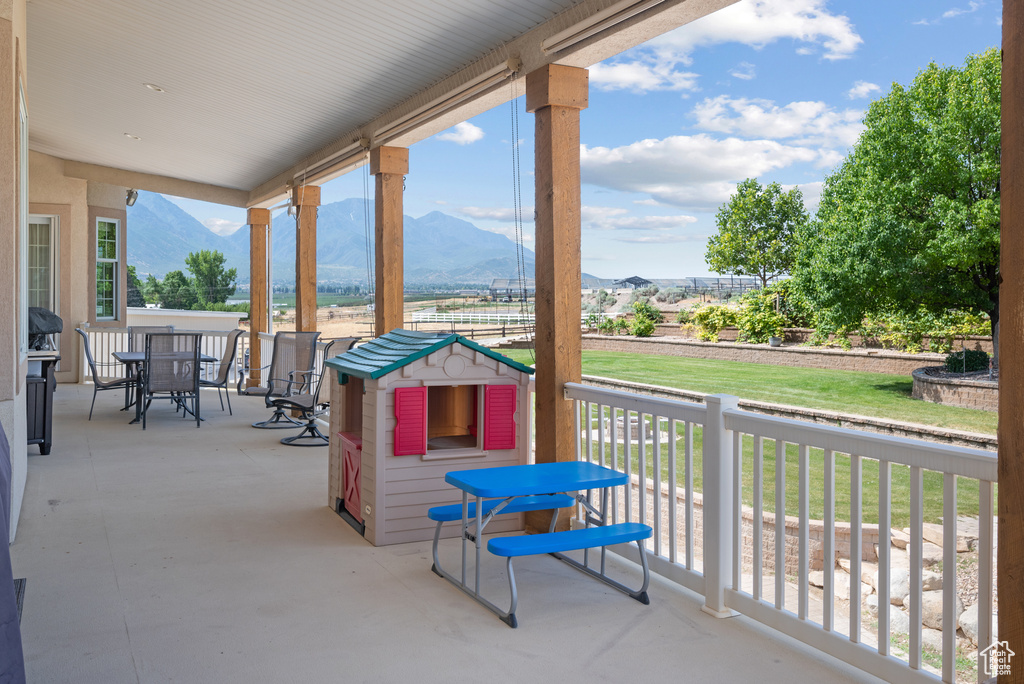 View of patio / terrace with a mountain view
