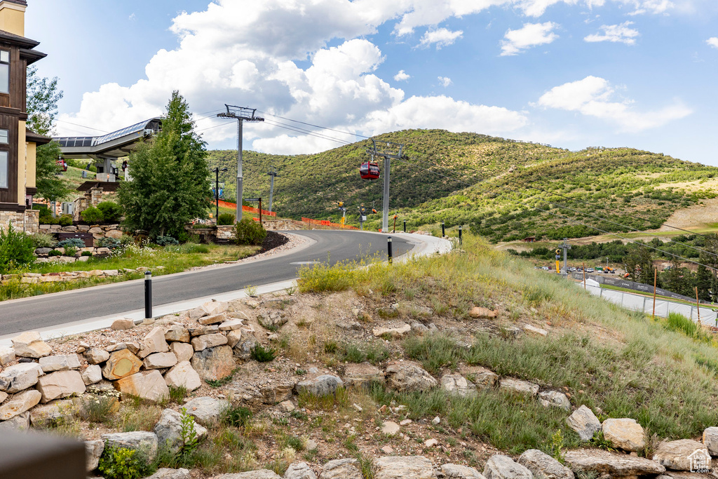 View of asphalt road featuring a mountain view