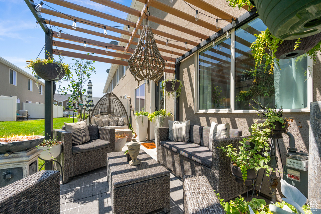View of patio / terrace featuring an outdoor hangout area and a pergola