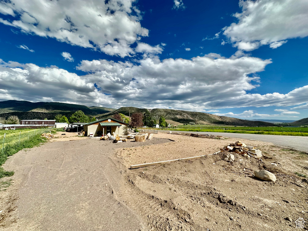 Exterior space with a mountain view and a rural view