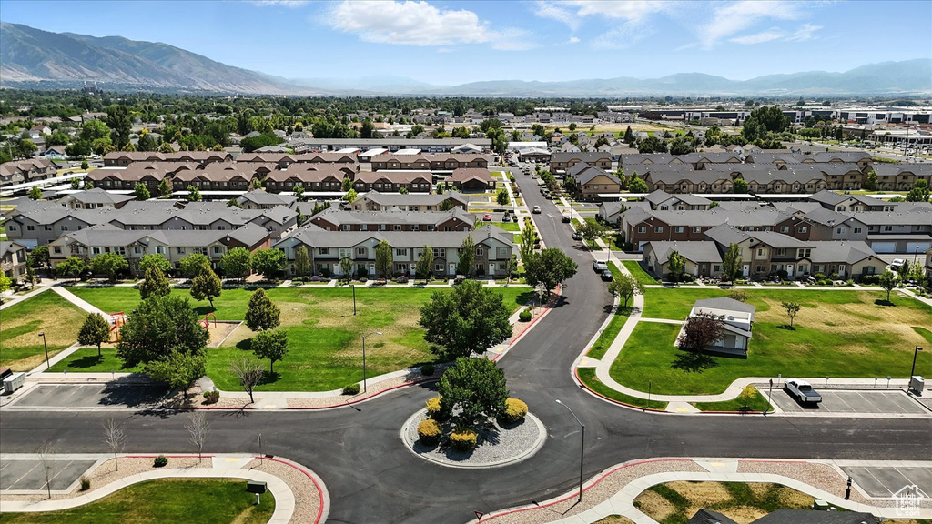 Aerial view of residential area featuring mountains