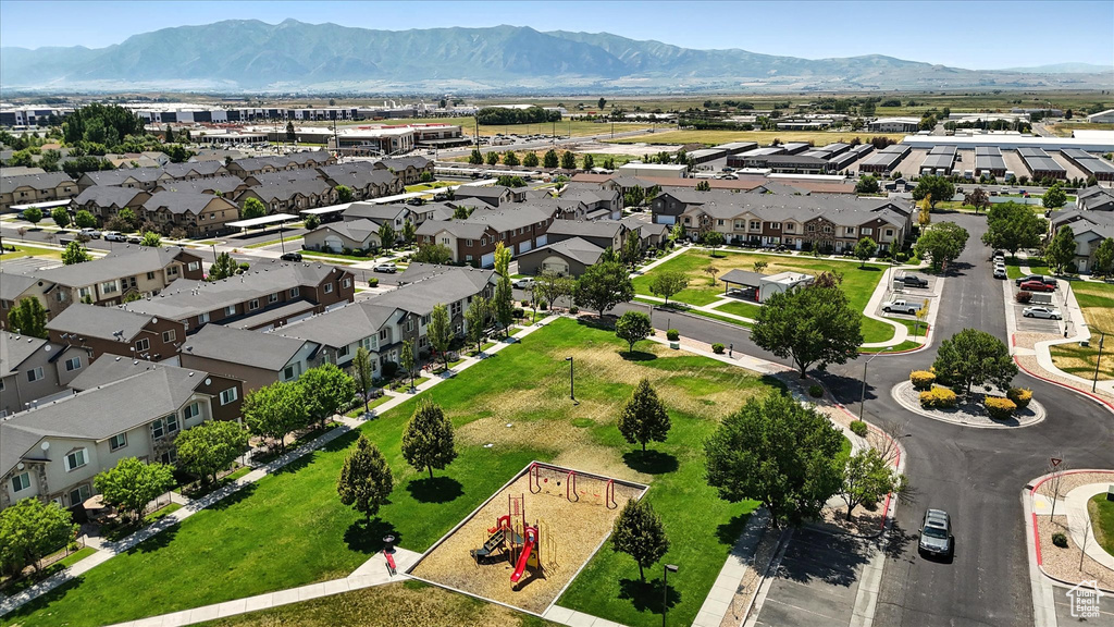 Aerial view of residential area featuring mountains