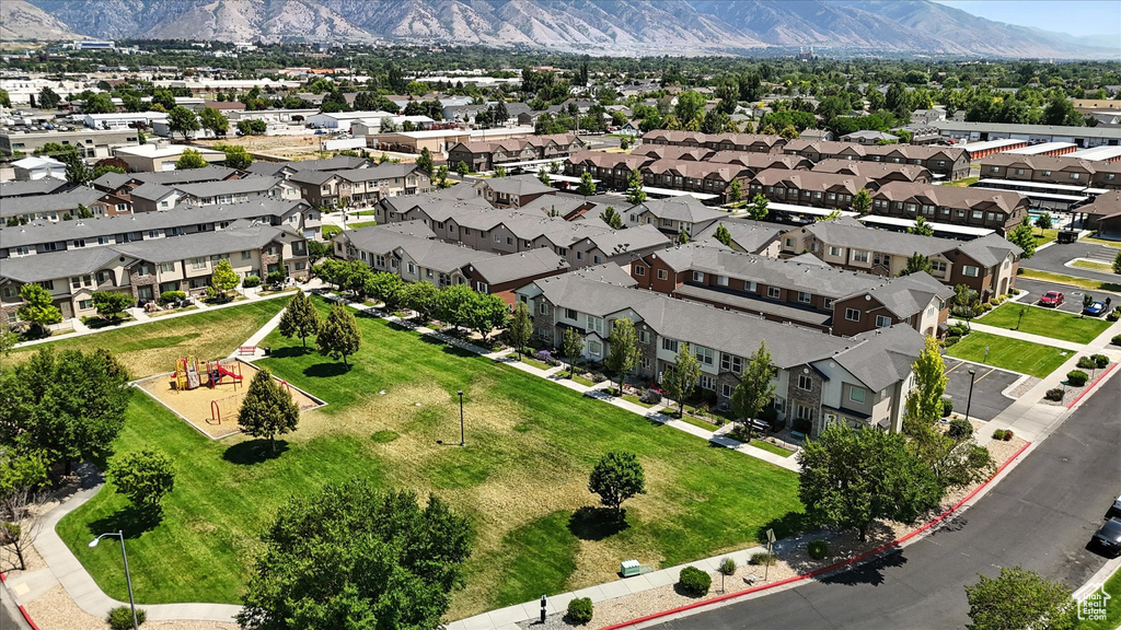 Aerial view of residential area with a mountain backdrop