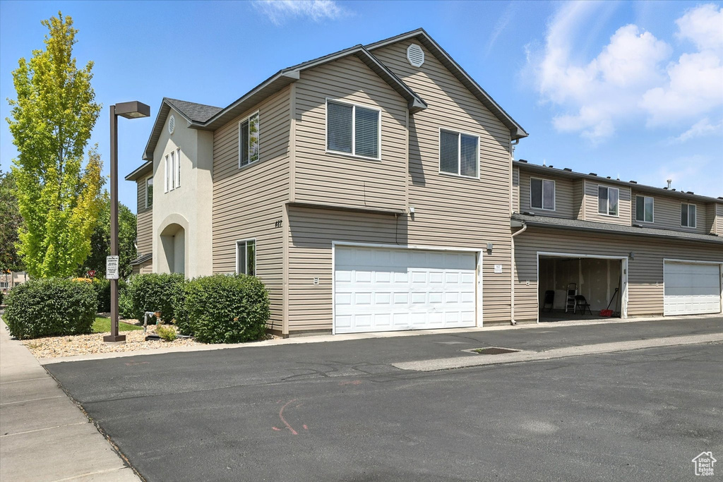 View of front of property featuring an attached garage