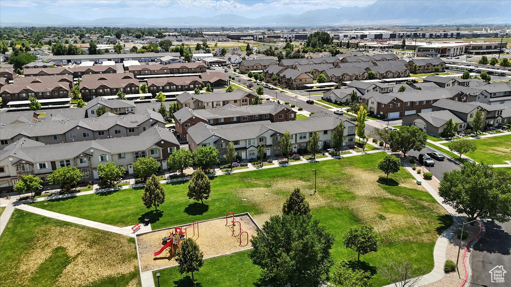 Aerial view of residential area with a mountainous background