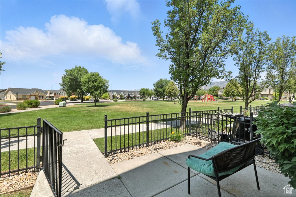 View of patio featuring a playground
