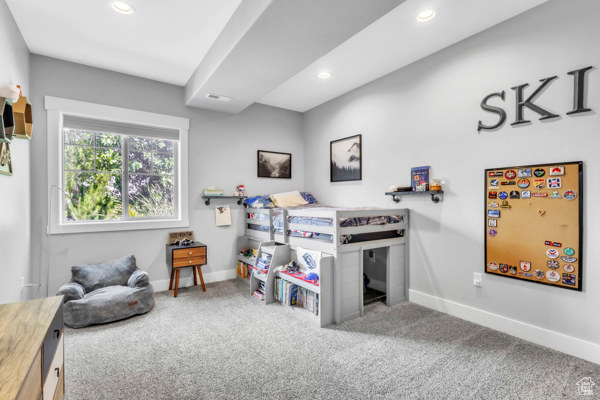 Bedroom featuring carpet and recessed lighting
