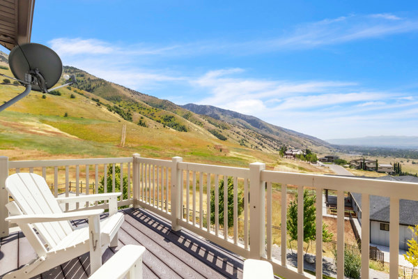 Wooden deck featuring a mountain view