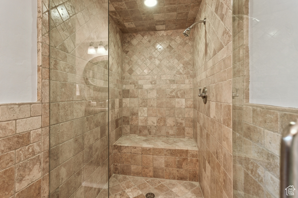 Full bath with a shower stall