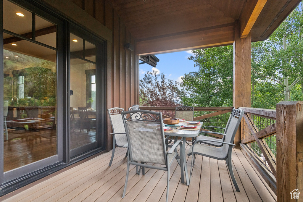 Wooden deck with outdoor dining space