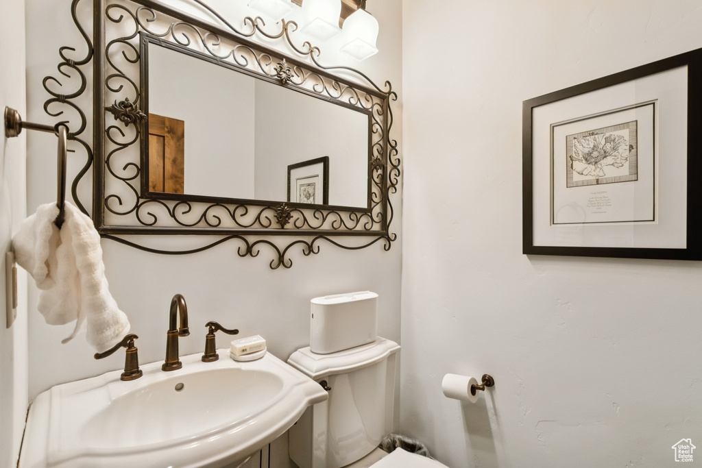Bathroom featuring a sink and toilet