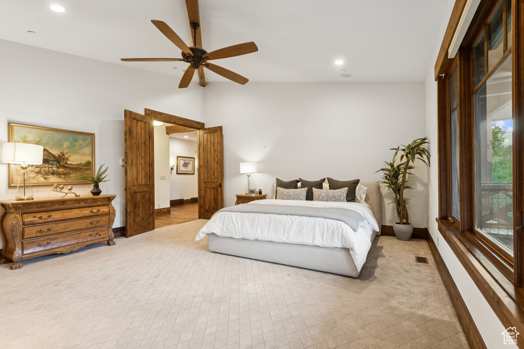 Bedroom with recessed lighting, lofted ceiling, a ceiling fan, and carpet flooring