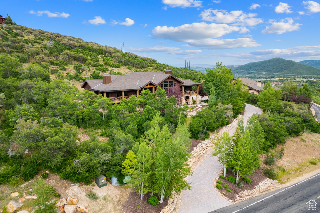 View of subject property with a mountainous background