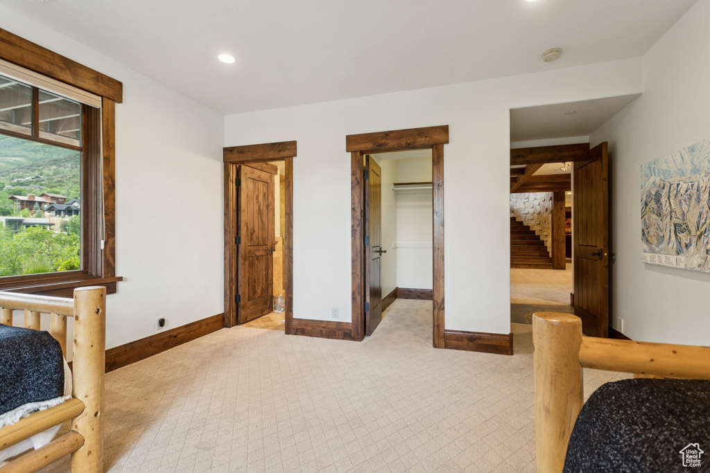 Bedroom featuring recessed lighting and a spacious closet