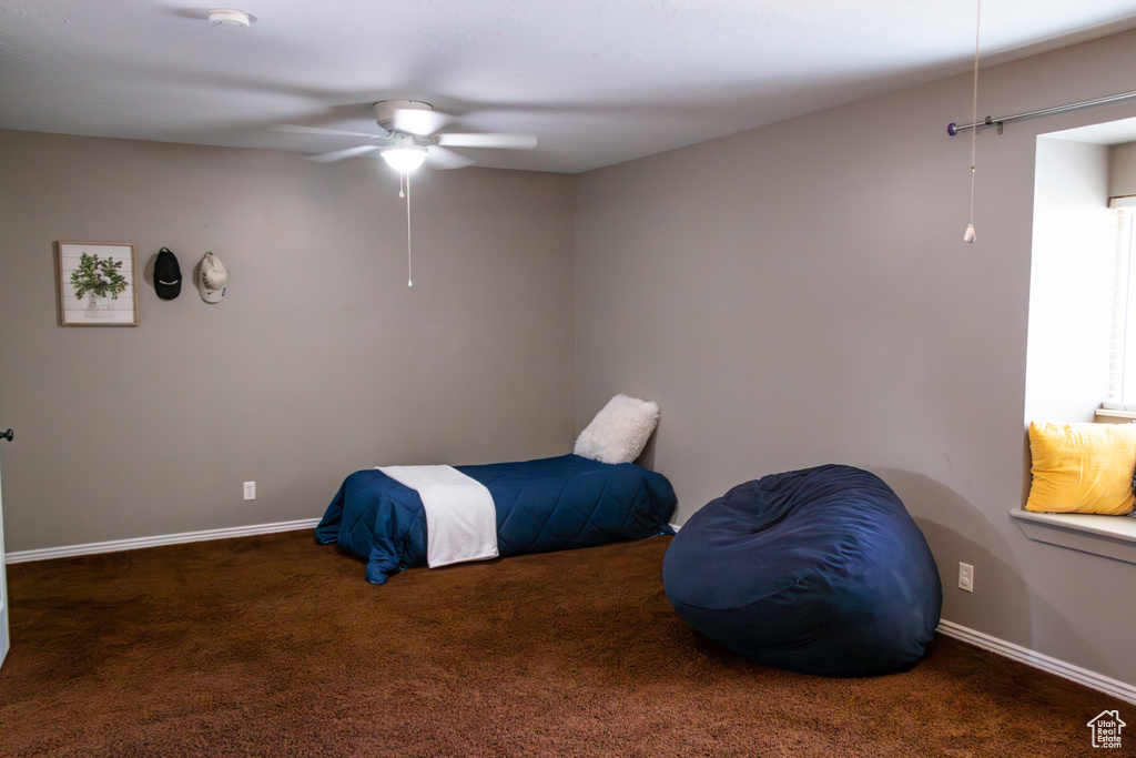 Bedroom with carpet flooring and ceiling fan