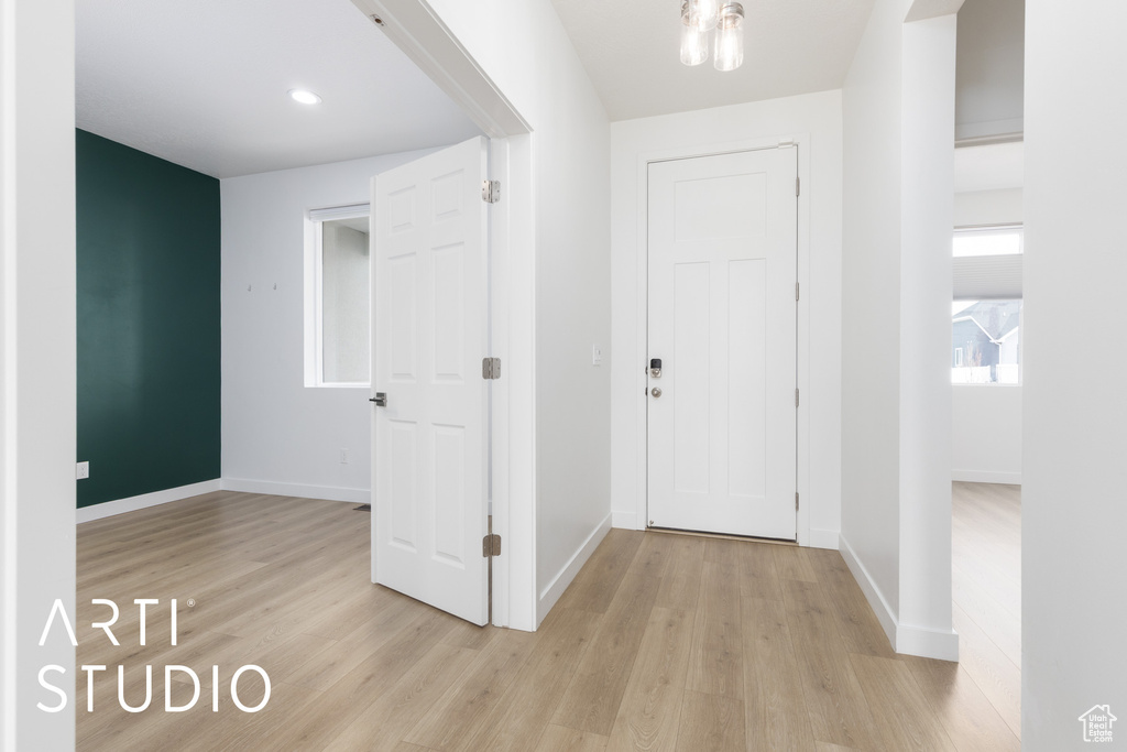 Entrance foyer featuring light wood finished floors