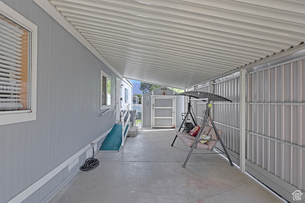 View of patio / terrace with a storage unit