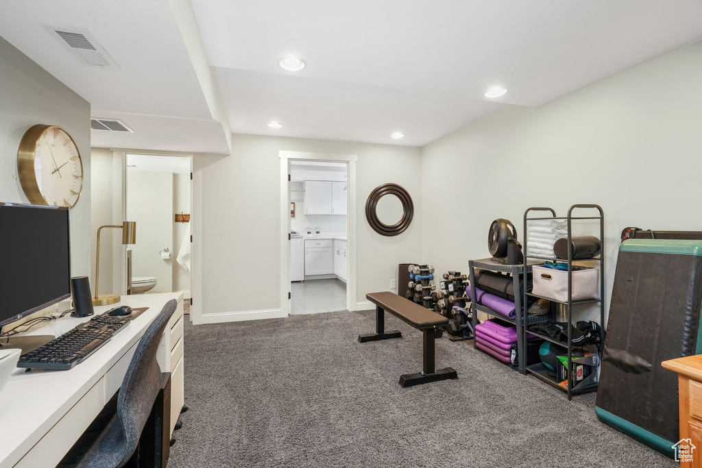 Home office with carpet floors, recessed lighting, and washer and dryer