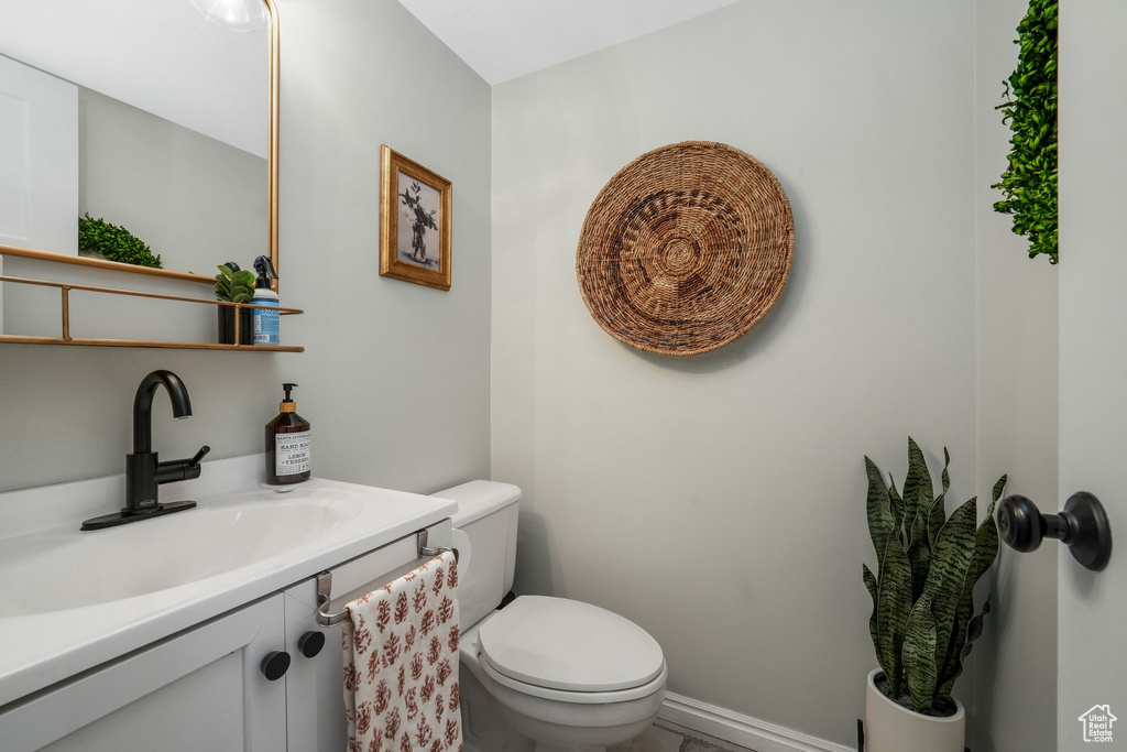 Bathroom with vanity and toilet