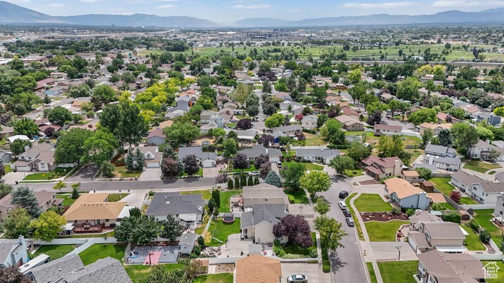 Aerial view of residential area with mountains