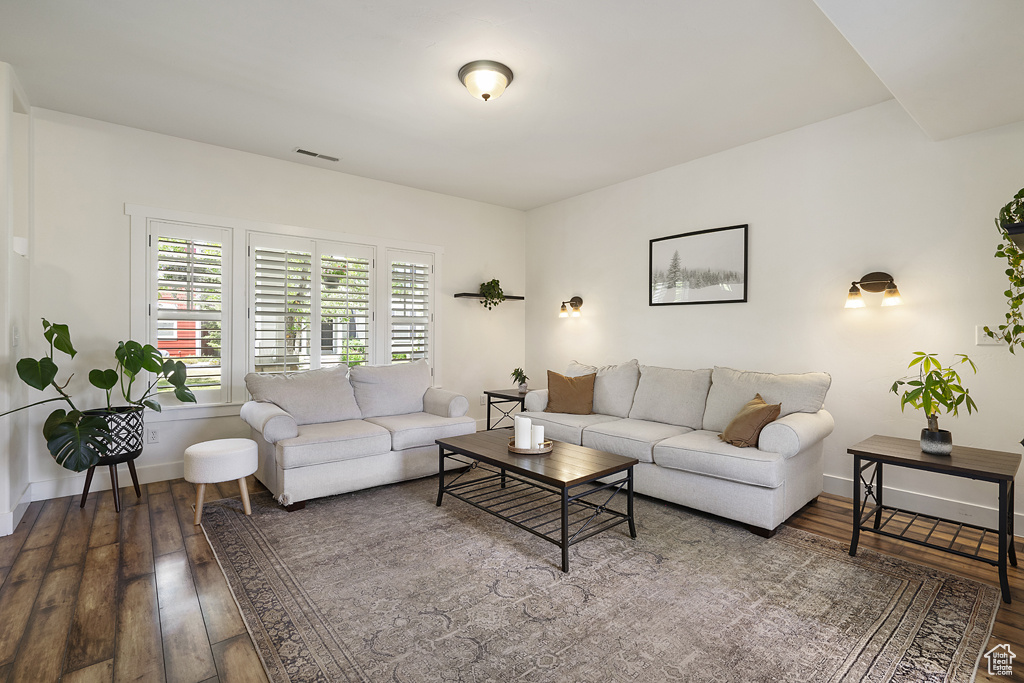 Living area featuring hardwood / wood-style floors