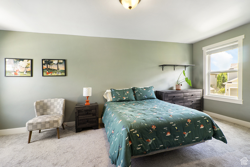 Bedroom featuring carpet